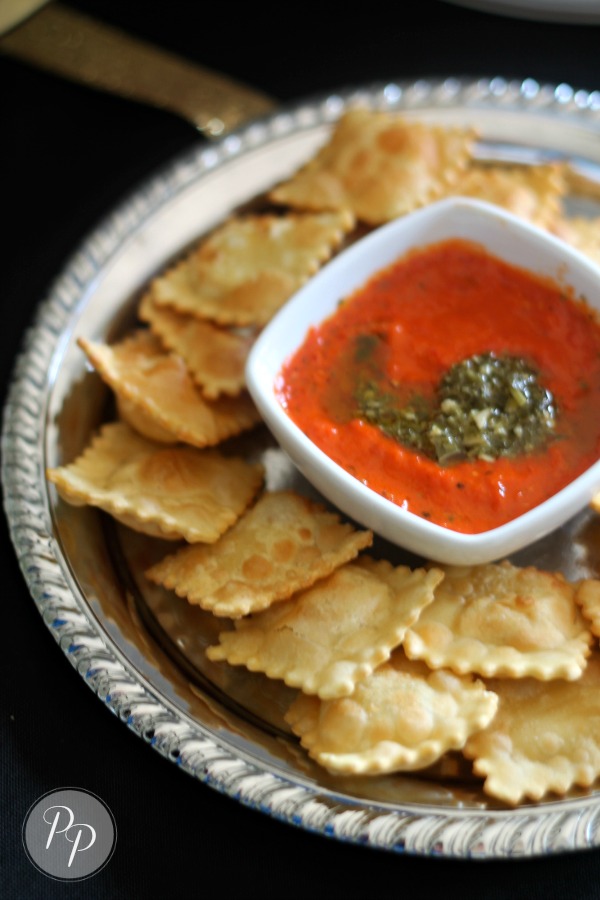 Crispy Cheese Ravioli with Red Pepper and Pesto Sauce Appetizer Recipe by PartiesforPennies.com  | 20 Budget-Friendly Appetizer Recipes