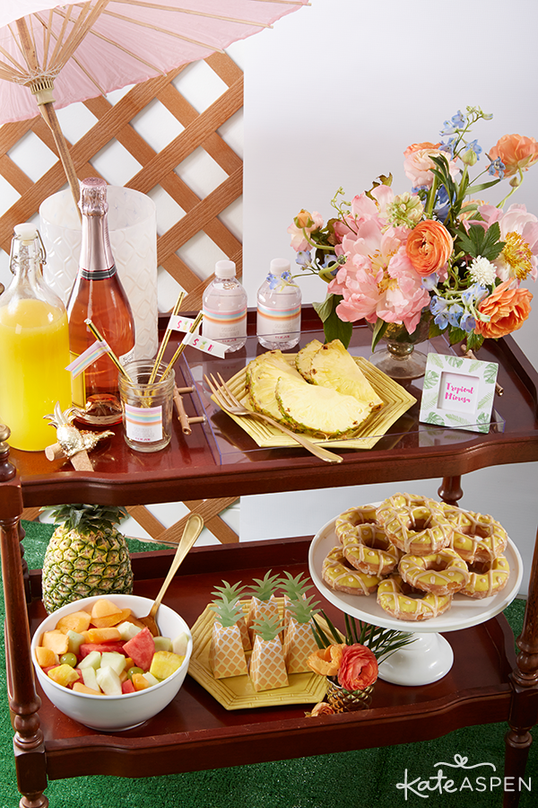 Everything you need to throw a Palm Spring Inspired Bridal Shower! Check out this Pineapple and Palms Bridal Shower with Kate Aspen on PartiesforPennies.com | Bar Cart