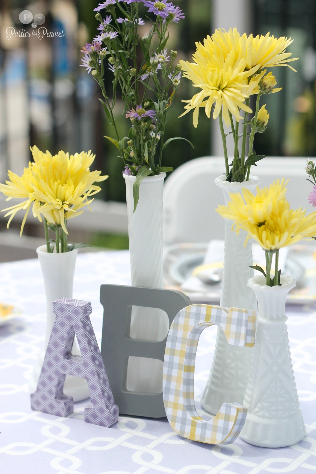 50 Ideas for Planning a Baby Shower | PartiesforPennies.com | Purple, Gray, and Yellow Baby Shower