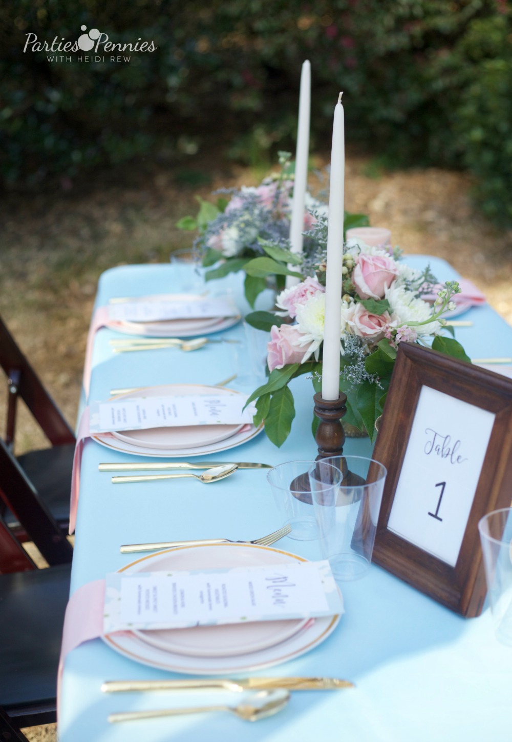 How to Plan a Wedding for under $5,000 | PartiesforPennies.com | Reception Table, Blue Tablecloth, Blue, Pink, Floral Arrangement