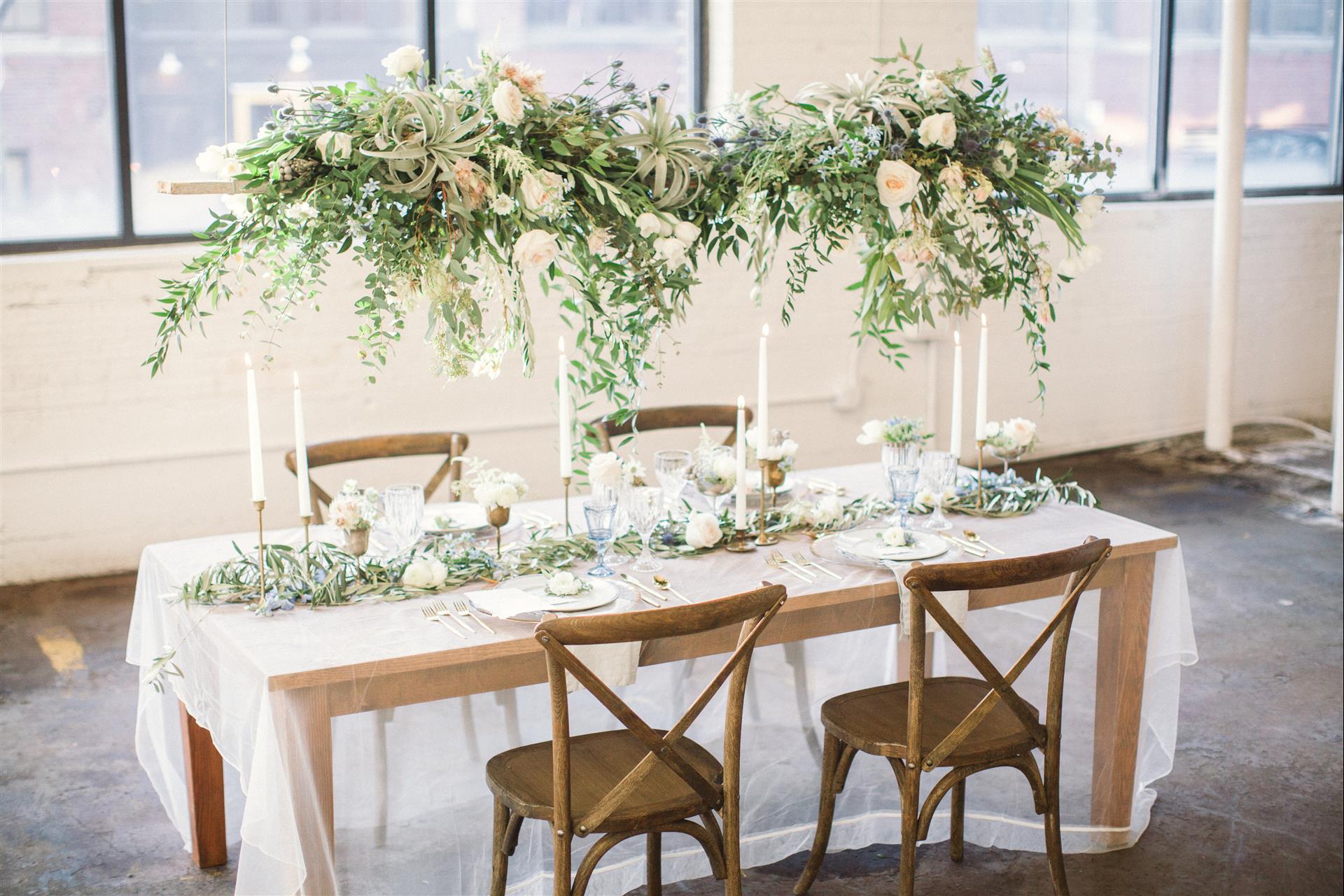 Feminine Wedding Inspiration by A Charming Fete | PartiesforPennies.com | Hanging Centerpiece, Greenery, Reception Table, Wedding