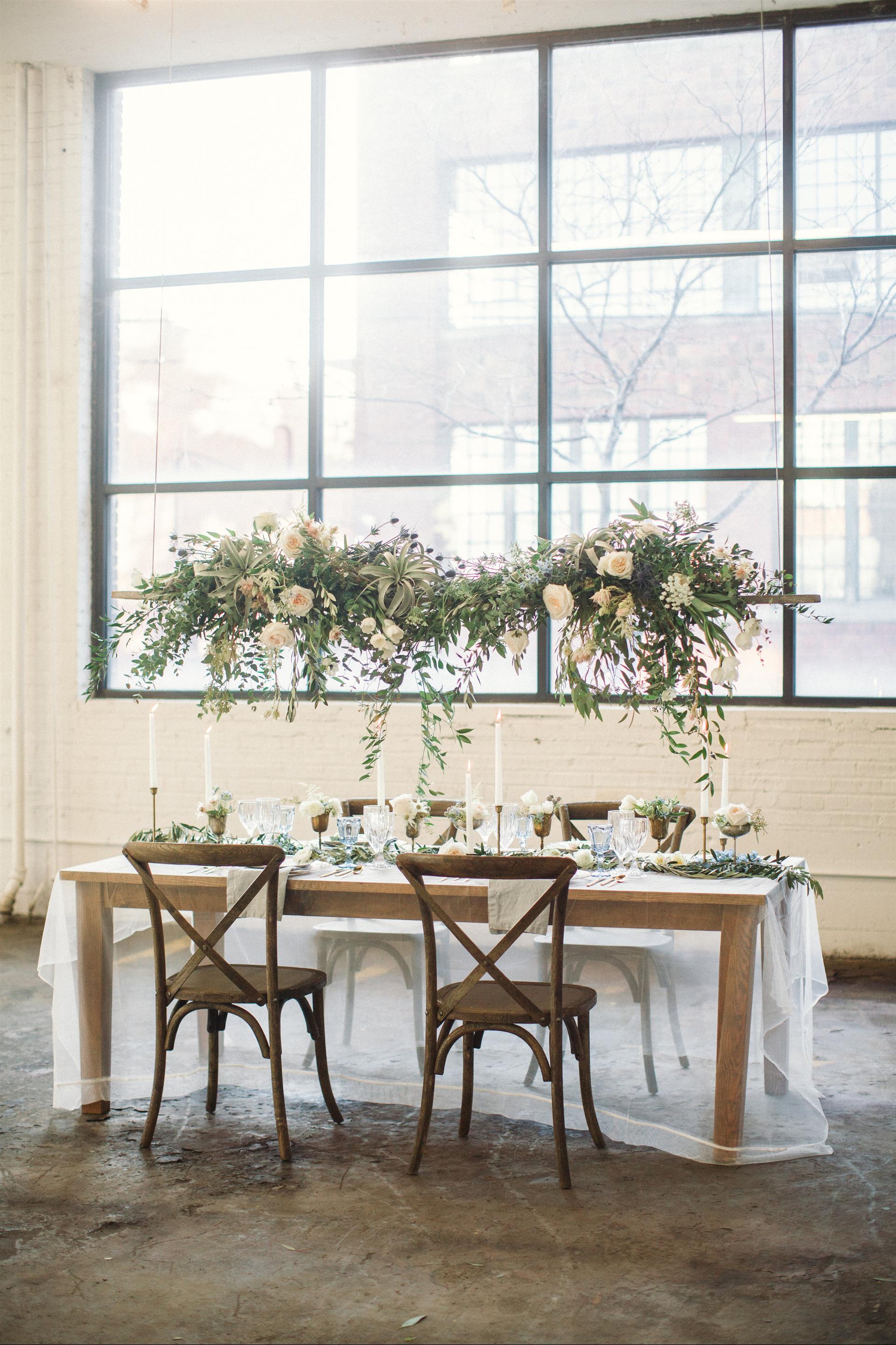 Feminine Wedding Inspiration by A Charming Fete | PartiesforPennies.com | Hanging Centerpiece, Greenery, Reception Table, Wedding